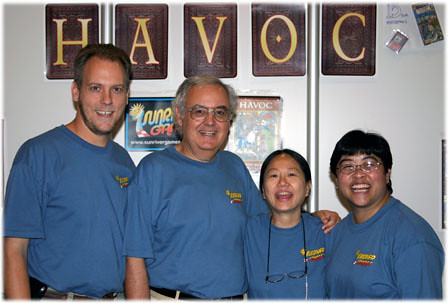 Chris, Doug, Mimi, and Lorna at the Booth