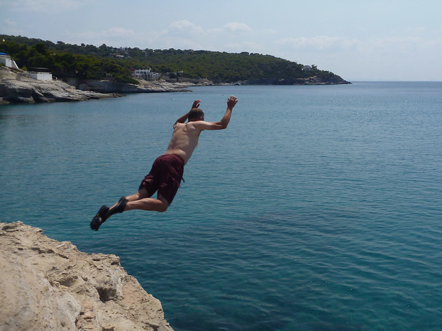 Chris jumping off a cliff on Aegina