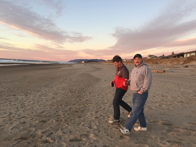 Ken and Jim strolling Salishan beach at Sunset