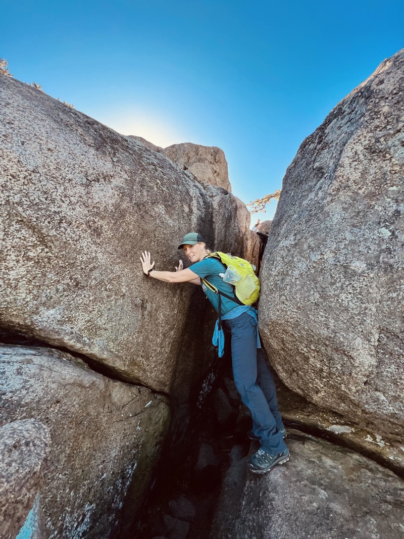 Julie scrambling in the rocks