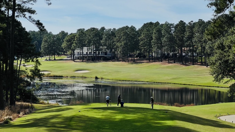 Teeing off over the water on number 18