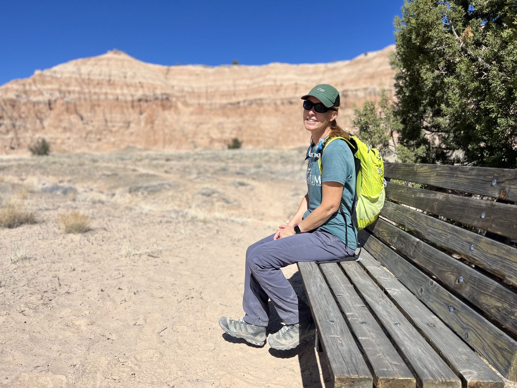 Julie resting on trail bench