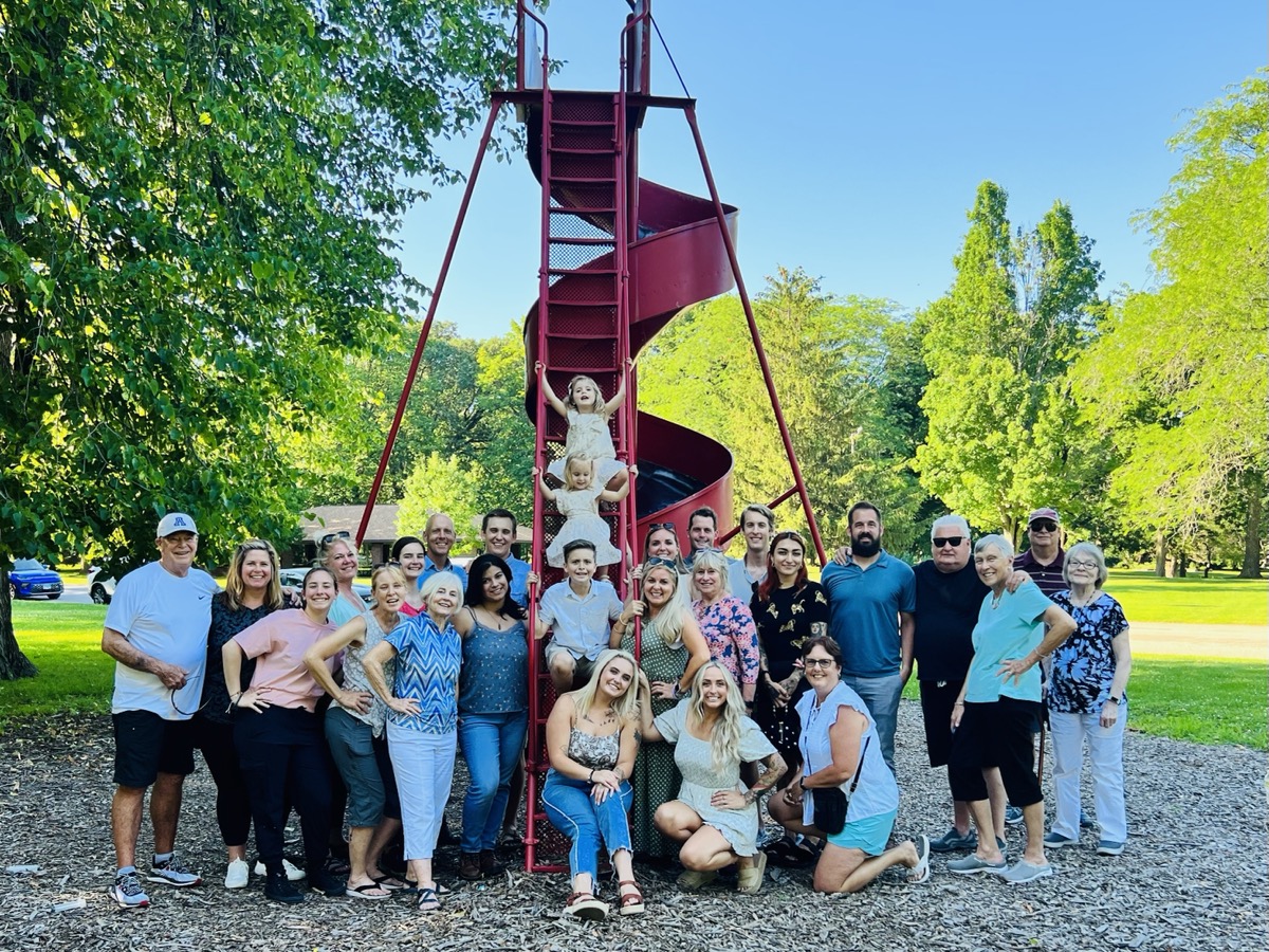 Family gathered at the slide