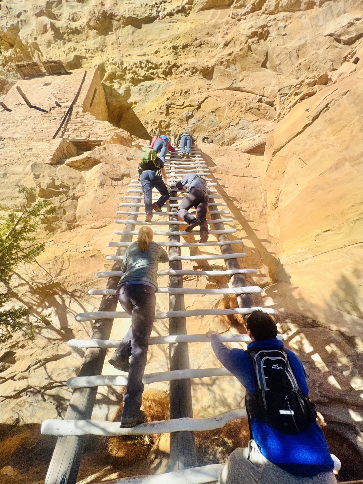 Climbing ladder at balcony house