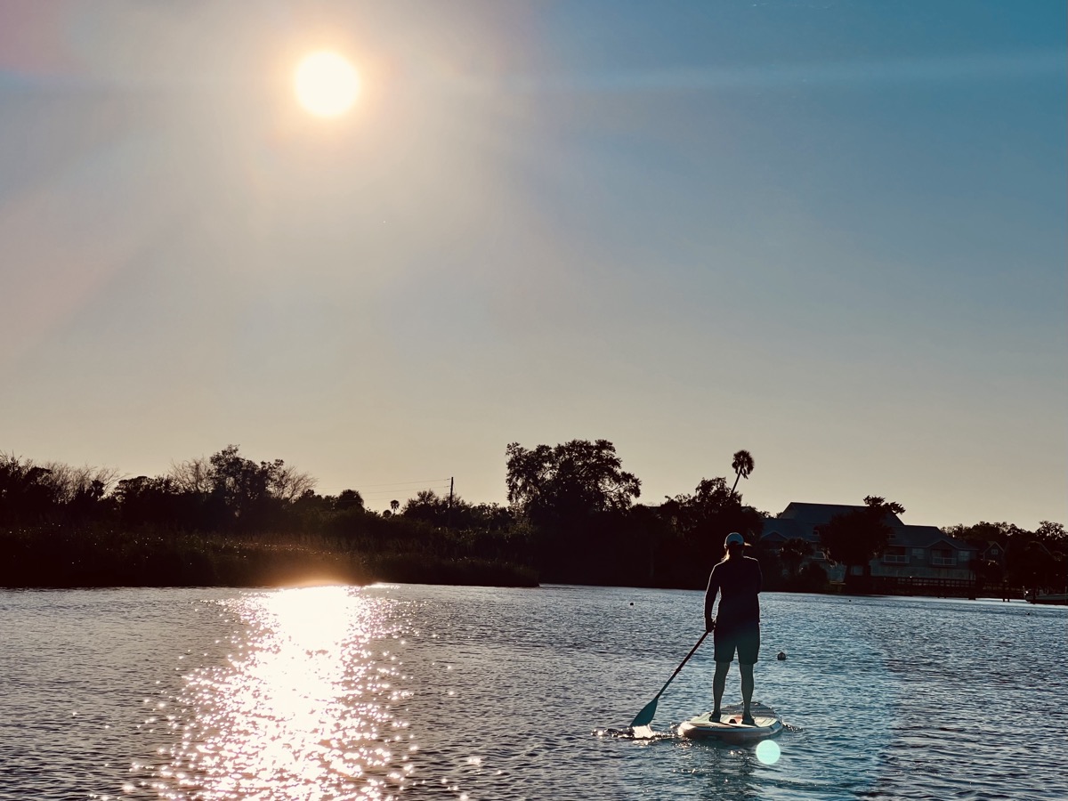 Karen paddles into the sunset