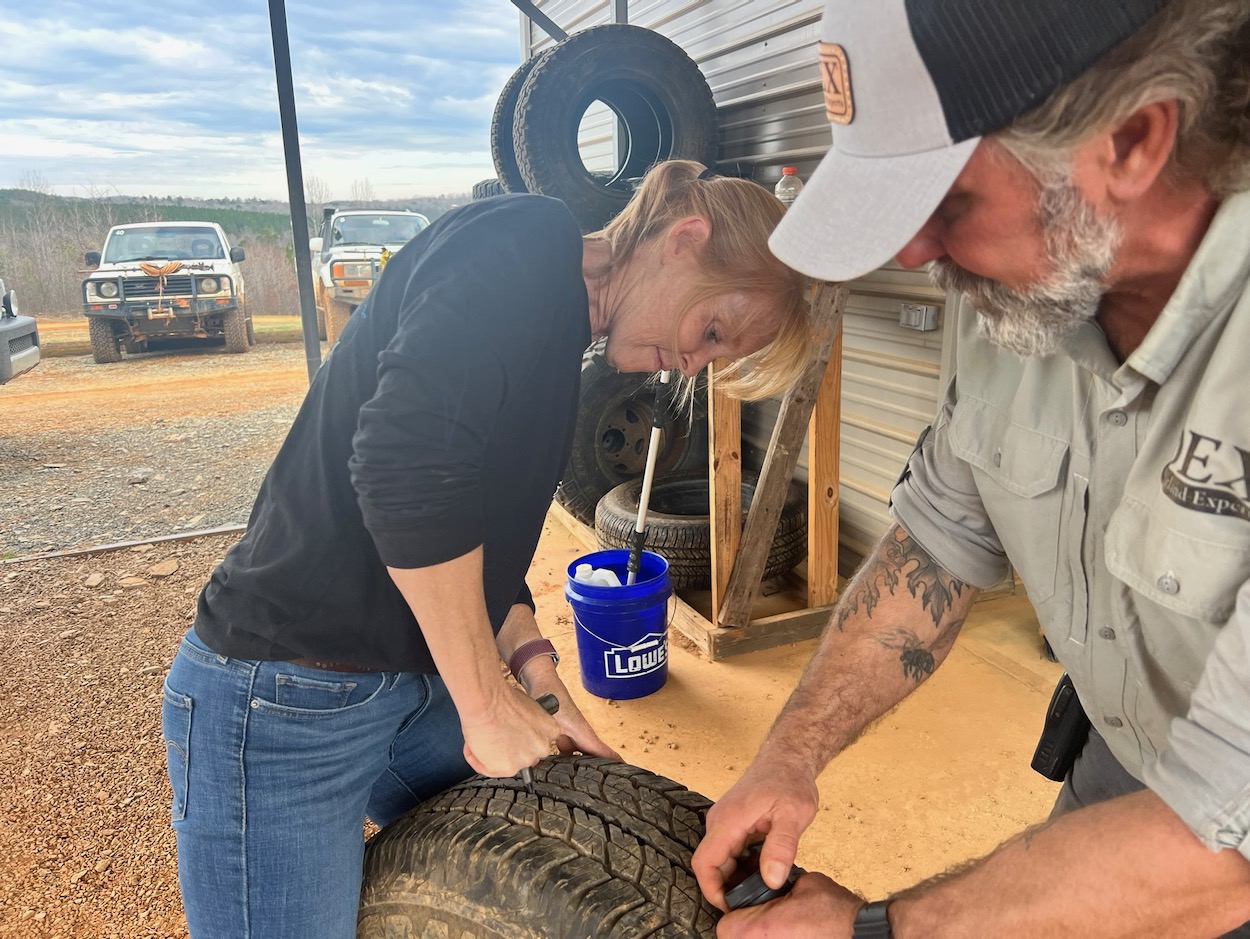 Julie repairs a tire