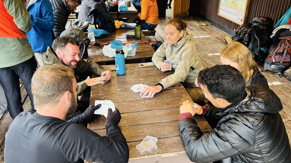 Karen playing cards with new friends