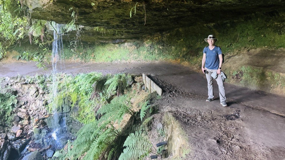 Julie under a waterfall in Maspie Den