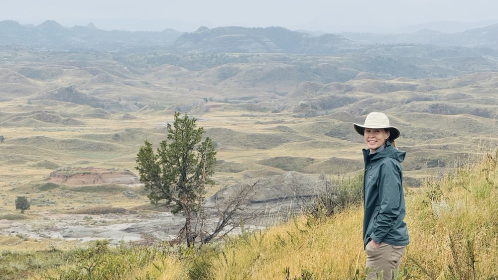 Julie hiking on our grey misty day