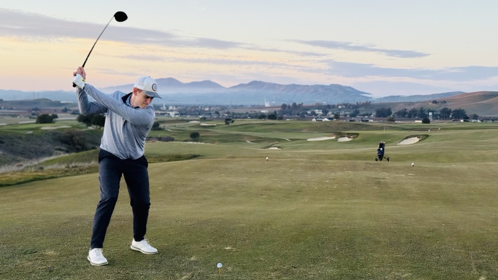 Jacob tees off on back 9