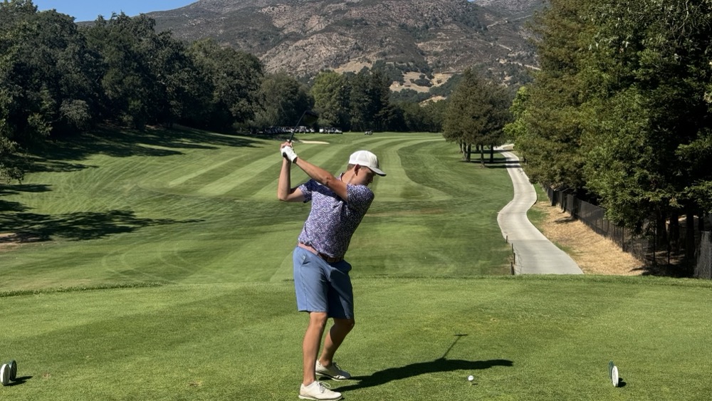 Jacob tees off as we compete in the horse race