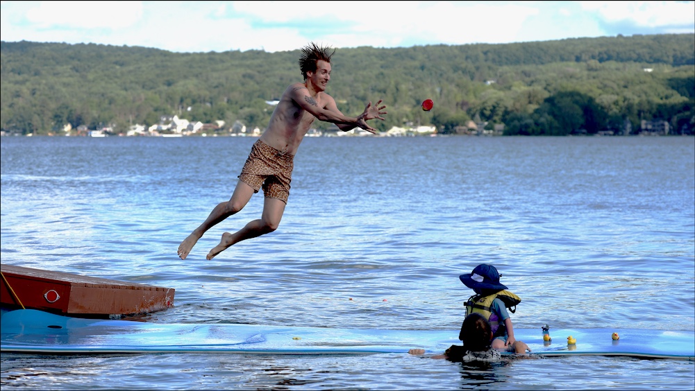 Matthew jumping off the raft while Rory watches